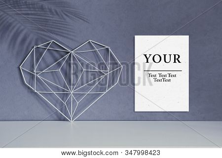 Home Decorative Frame In The Form Of A Heart On A Background Of Gray Wall, Interior. Concept Symbol 