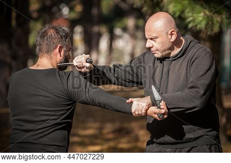 Knife Vs Knife Fight. Kapap Instructors Demonstrates Sombrada Drill Training
