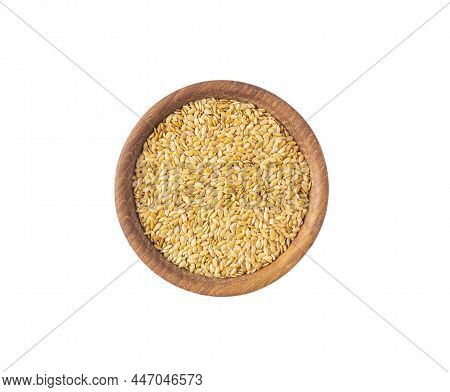 Golden Seeds Of Flax On White Background. Top View. Seeds Of Flax In A Bowl Isolated On White Backgr