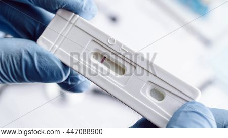 Coronavirus Test Antigen Covid Kit. Doctor Holding Rapid Covid Medical Test. Laboratory Hospital Lab