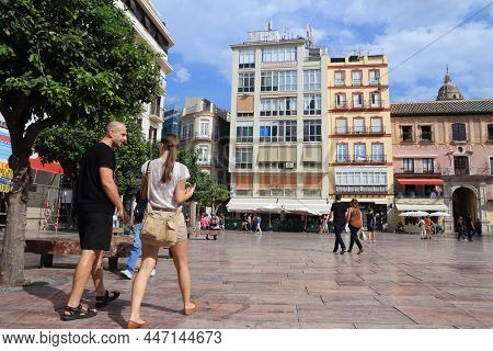 Malaga, Spain - October 4, 2014: People Visit Plaza De La Constitucion In Old Town In Malaga, Spain.