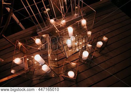 Evening Composition Of Geometric Candlesticks With Candles