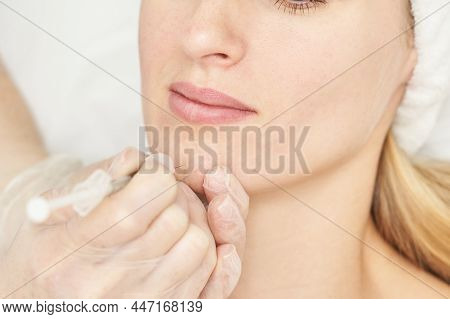 Injection At Spa Salon. Doctor Hands In Gloves. Closeup. Pretty Female Patient. Beauty Treatment. He