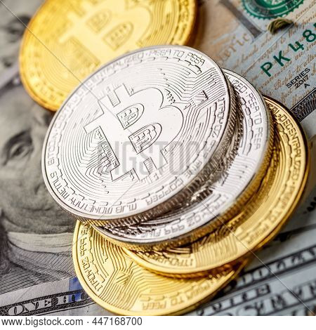 Golden Bitcoin Lies On The Banknotes.new Virtual Money. Crypto Currency Top View. Real Coins Of Bitc