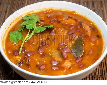 A Bowl Of Bean Soup. First Course. Dinner. Tomato Soup With Beans, Carrots, Parsley And Bay Leaf. Ho