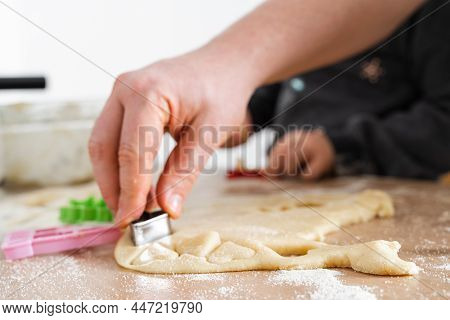 Father Feeling Playful With His Caucasian Little Daughter, While Preparing Homemade Dough For Tasty 