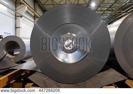 Closeup Photo Of Metal Tile For Roof In Metallic Forming Machine Production Line In Factory. Manufac