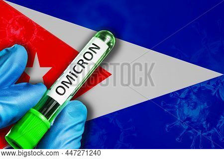 Guyana Outbreak Of Omicron Variant. A Hand In A Blue Rubber Glove Holds A Test Tube With Covid-19 Vi