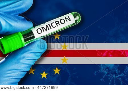 Cabo-verde Outbreak Of Omicron Variant. A Hand In A Blue Rubber Glove Holds A Test Tube With Covid-1