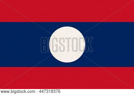 Flag Of Laos. Laotian Flag On Fabric Surface. Fabric Texture. Lao People Democratic Republic. Lao St