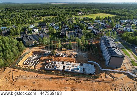 Suburb House Construction In Forest Area. Home Construction Of Ceramsite Blocks. Construction Site O