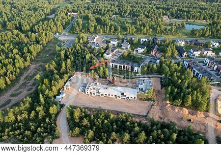 Suburb House Construction In Forest Area. Home Construction Of Ceramsite Blocks. Construction Site O