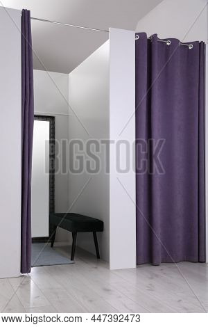 Empty Dressing Room In Fashion Store. Stylish Interior