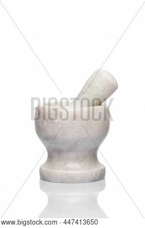 A Simple Kitchen Mortar And Pestle For Grind Ingredients. Set Of Tools For Preparing Substances By C