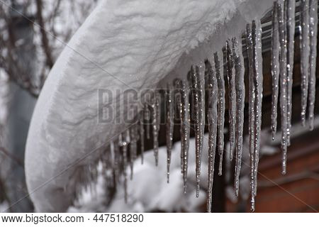 Melting Snow Of A Bizarre Shape In Early Spring