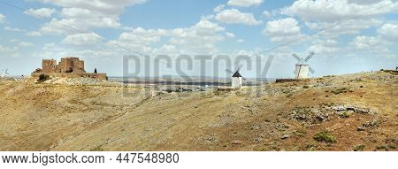Drone Point Of View Tourists Visiting Famous Windmills In Consuegra Town, Symbol Of Castilla-la Manc