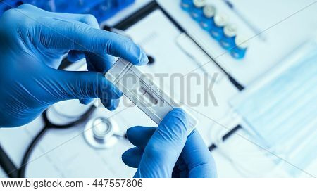 Coronavirus Test Antigen Covid Kit. Doctor Holding Rapid Covid Medical Test. Laboratory Hospital Lab