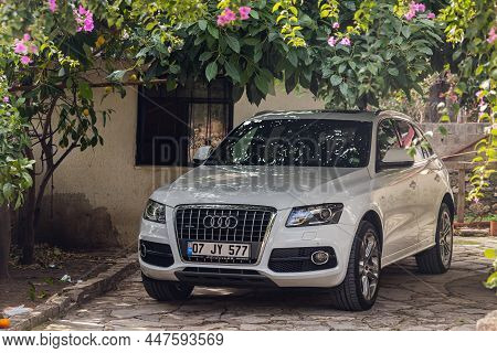 Side, Turkey -january 22, 2022: White Audi Q5    Parked In The Courtyard Of A Private House Under A 