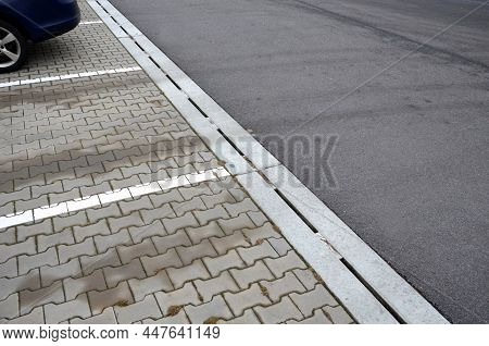 Drainage Element In Interlocking Paving Concrete Gutter With Slotted Drain From One Piece Of Concret
