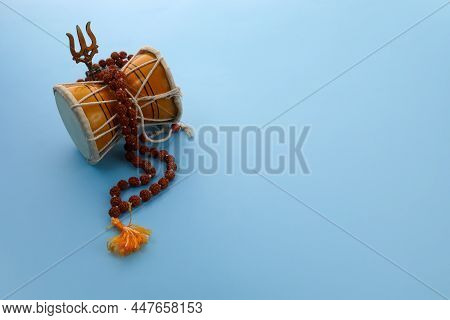 Shivaratri Background With Shivas Trident And Pellet Drum Damroo Musical Instrument . Hindu Festival