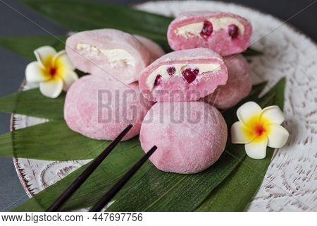 Delicious Japanese Cuisine Dessert Mochi Pink Brownies With Butter Cream And Currants With Bumbu Lea