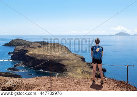 Madeira, Portugal - August 28, 2021: An Unidentified Young Woman On The Ponta Do Furado Viewpoint At