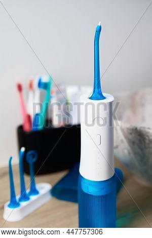Blue Home Oral Irrigator Kit In Bathroom, Waterpik For Teeth Cleaning, Portable Water Flosser For De