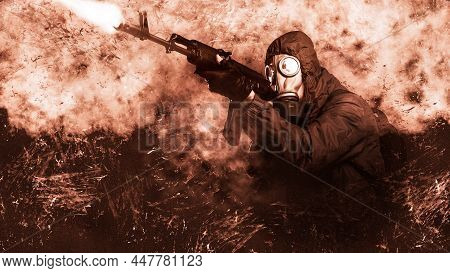 Adult Male Stalker Shoots From A Machine Gun, An Automatic Rifle, A Weapon. He Is Dressed In A Prote