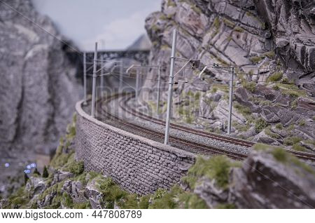 Retro Train On A Mountain Rail Landscape