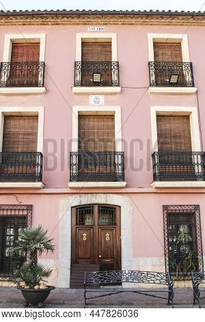Polop, Alicante, Spain- November 28, 2021: Typical Facades Of The Historical Town Of Polop In Alican