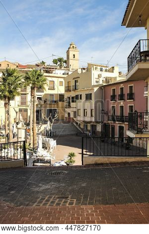 Polop, Alicante, Spain-november 28, 2021: Square Called Purisima And Typical Facades Of The Historic