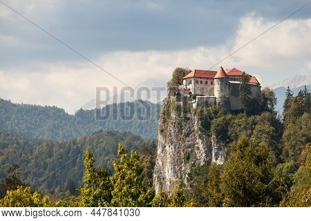 Selective Blur On The Bled Castle, Also Called Blejski Hrad, During Autumn In A Sunny Afternoon By T