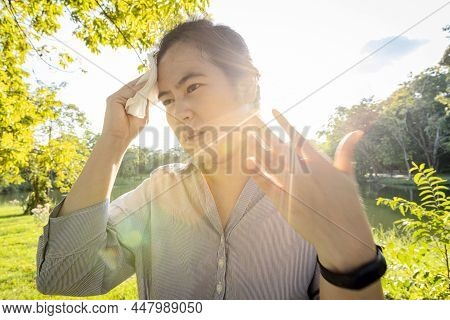 Asian Woman Wiping Sweat On Face With Tissue Paper Suffer From Sunburn Very Hot In Summer Weather Pr