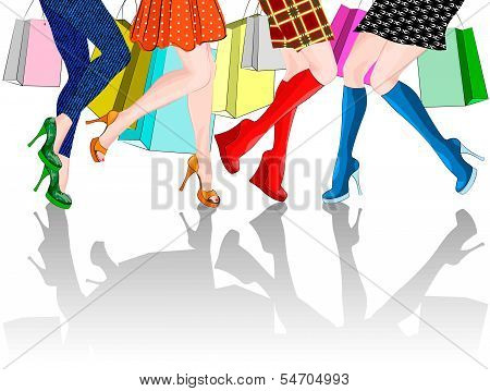 legs of four girls with Shopping Bags