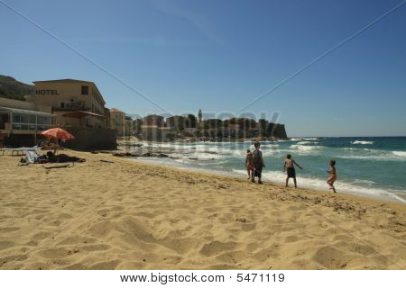 Kids Playing On The Beach