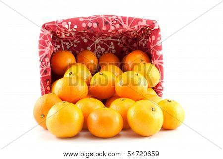 Mandarins Or Tangerines Are Poured Out Of The Basket