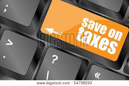 Save On Taxes Word On Laptop Keyboard Key, Business Concept