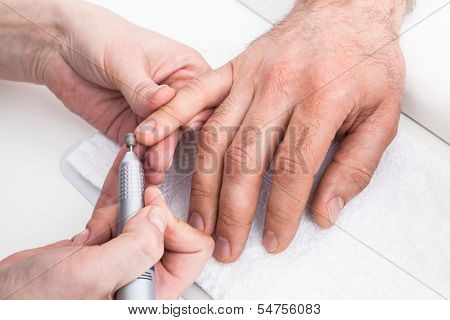 Manicure man close-up to the beauty salon