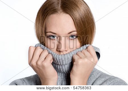 Closeup Portrait Of A Beautiful Young Woman In A Sweater