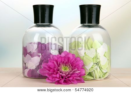 Aromatherapy minerals - colorful bath salt on light background
