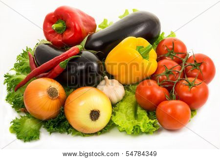 Colorful Vegetables Lie On Salad Leaves