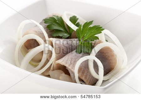 Herrings With Sliced Onion In White Bowl