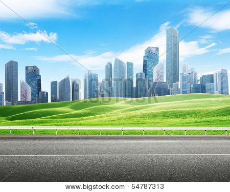 Asphalt road and modern city 