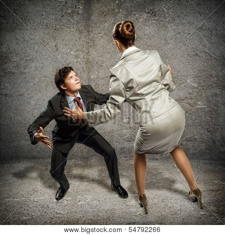 two businessmen fighting as sumoist