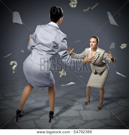 two businesswomen fighting as sumoist