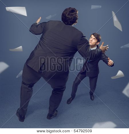 two businessmen fighting as sumoist