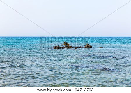Old Venetian Lighthouse At Harbor In Crete, Greece. Small Cretan Village Kavros. Travel Background