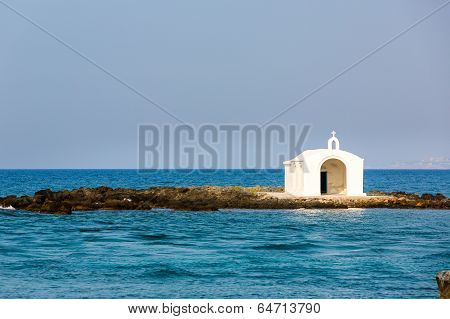Old Venetian Lighthouse At Harbor In Crete, Greece. Small Cretan Village Kavros. Travel Background