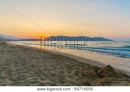 Beach On Sunset In Village Kavros In Crete  Island, Greece. Magical Turquoise Waters, Lagoons. Trave