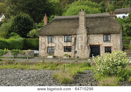 Thatched House By Beach